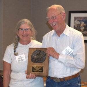 Andrea Mann receiving Trail Boss Award.